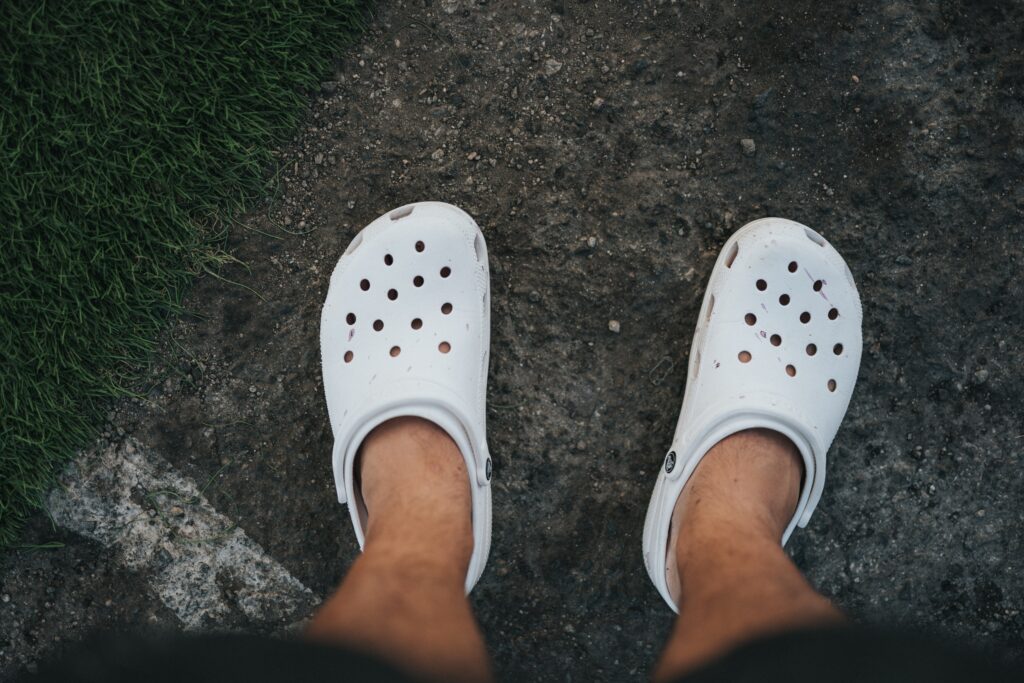 Crocs Inc.'s iconic clog silhouette is sold in more than 90 countries worldwide. - Image Credit: Nathan Dumlao from Unsplash